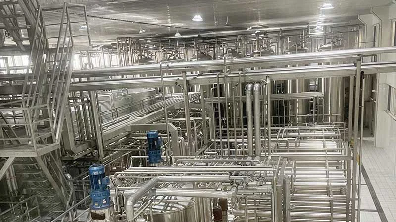 Technician Monitoring Production